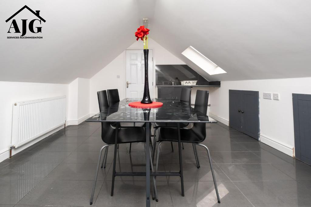 Dinning table at AJG Serviced Accommodation Hodge Hill Airbnb Booking Cheap